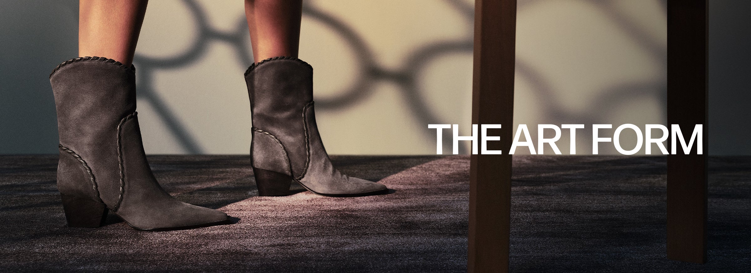  Hero banner featuring a pair of brown or black Western-style boots for the Fall season. Explore the Fall Western boots collection.