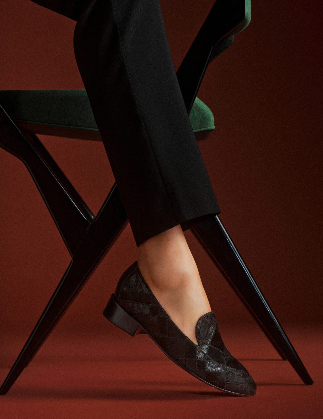 Majestic Duo: Woman in brown leather trench coat over brown satin dress, with a white horse. Introducing Tibbie Sandal in Black, part of our New Arrivals for Pre-Fall.