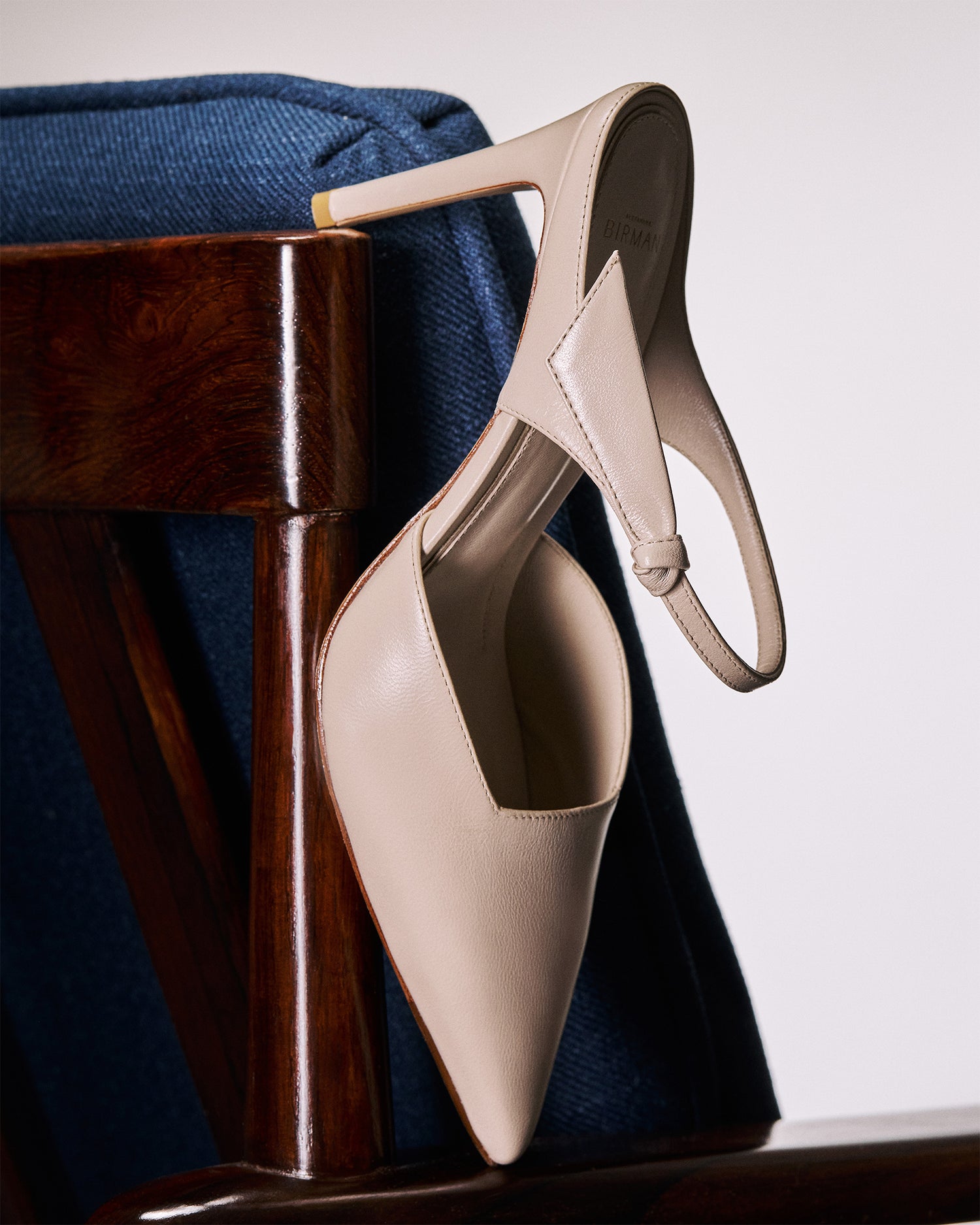 Clarita Asymmetric Sling Mule Shell Pumps R/26